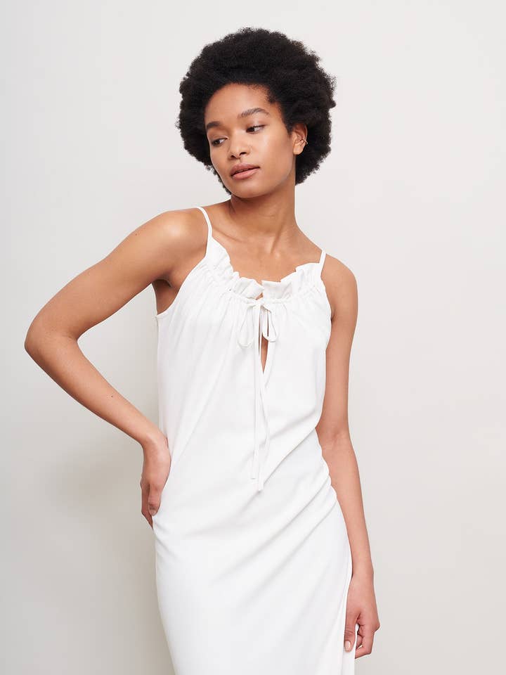 Ruffle Dress in Cream for wholesale by Cucumber Clothing