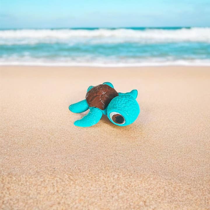 3D in Paradise - Wholesale Fidget Toy - Kids - Mini sea turtle big eye teal fidget toy articulated 1