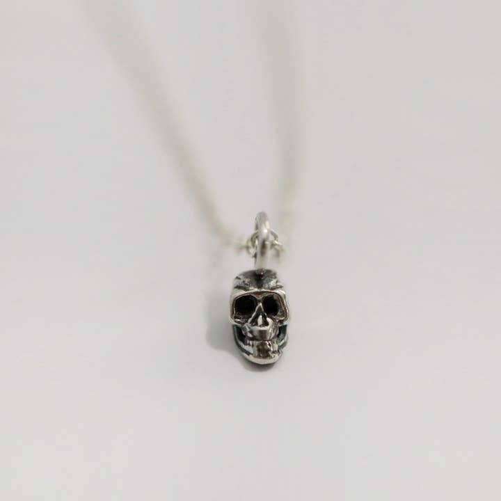 Petite Skull Layering Necklace in Sterling Silver for wholesale by Metrix Jewelry