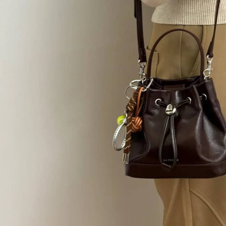 Brown Simple Baseball Braided Rope Bag Charm DP25E934 for wholesale on Faire1