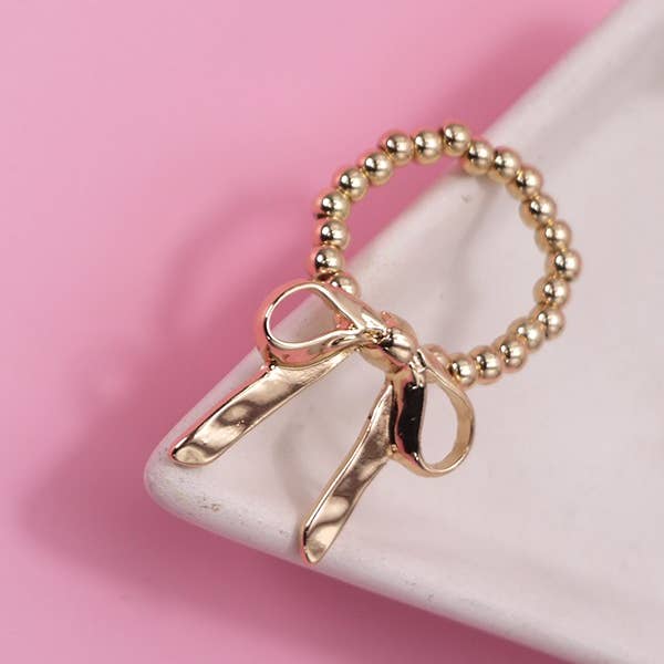 GOLD BOW RIBBON STRETCHABLE RING | 31R24002 for wholesale on Faire