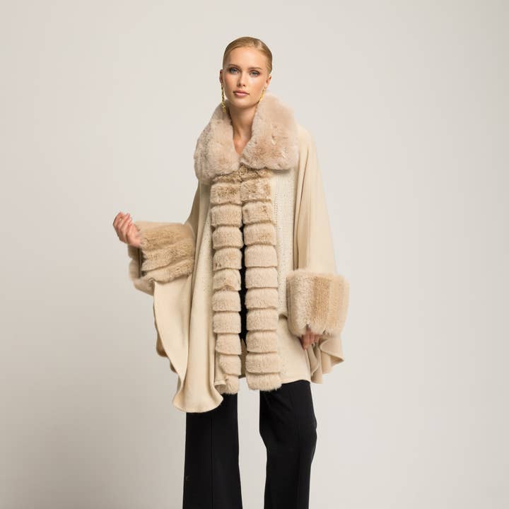 Beige poncho Gia and other Purchase Wholesale tonno pinna gialla prezzo. Free Returns & Net 60 Terms on Faire trending on Faire.
