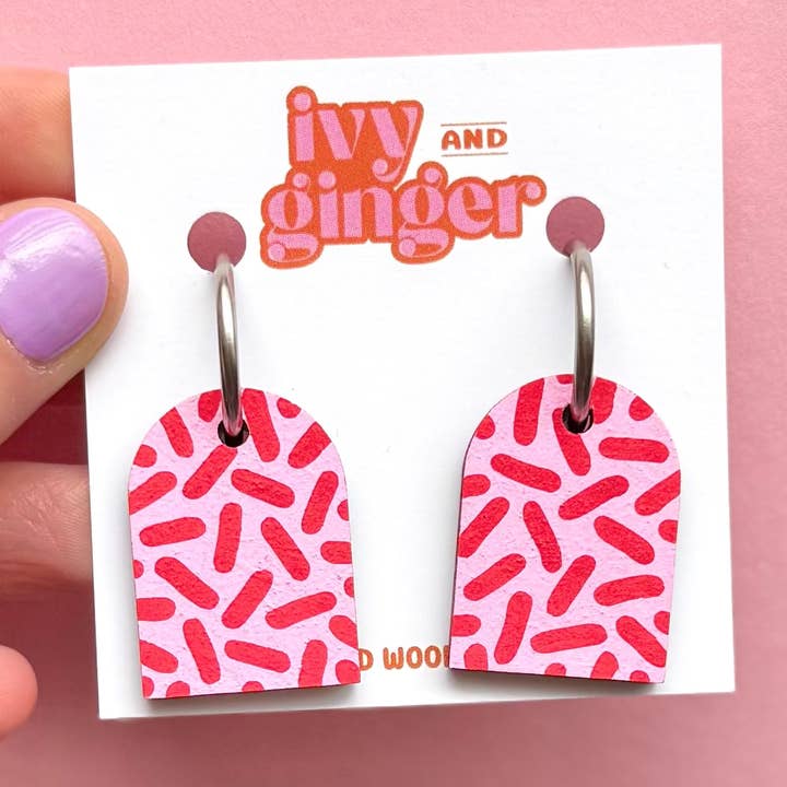 Pink and red dash print arch dangle hoop earrings for wholesale by ivy and ginger