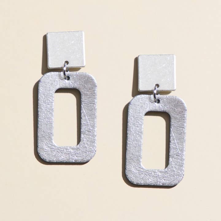 Logan d'argento vintage per la vendita all'ingrosso da parte di Nickel and Suede