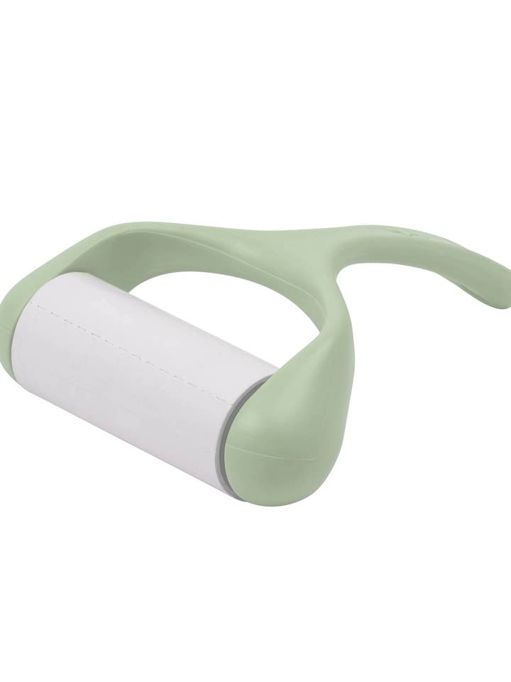 Hairdryer brush with refillable adhesive roller for wholesale by United Pets