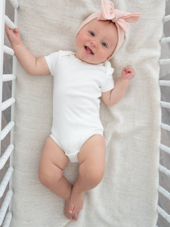 GOTS Certified Organic Cotton Short Sleeve Baby Bodysuit for wholesale by Earth Angel Apparel