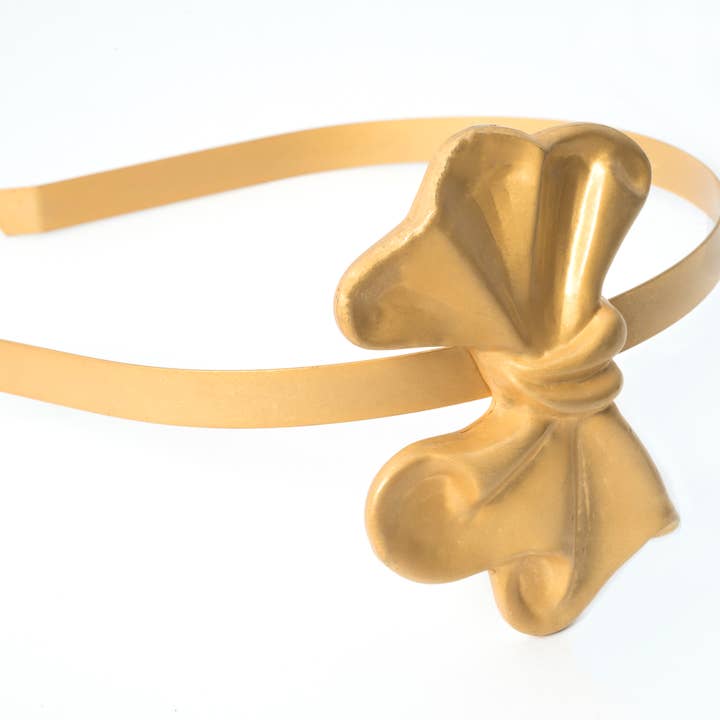 Satin metallisk pandebånd med bue for engroshandel hos HUB161