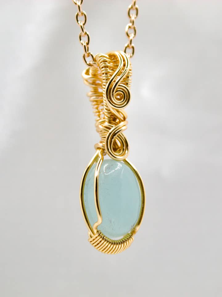 Wire-wrapped Simple Pendant, Handcrafted wire necklace for wholesale by Manifest Harmony