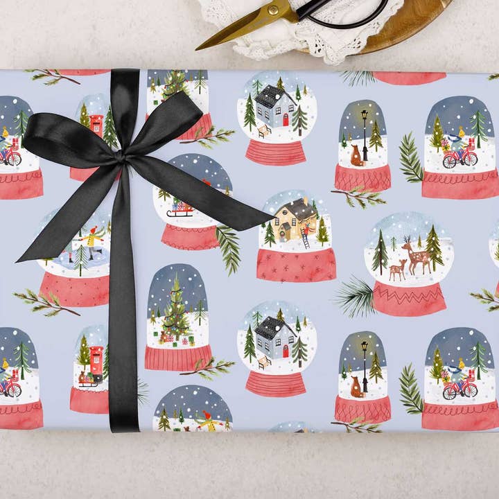 Blue Snow Globe Christmas Wrapping Paper | Gift Wrap Sheet for wholesale by Making Meadows Ltd