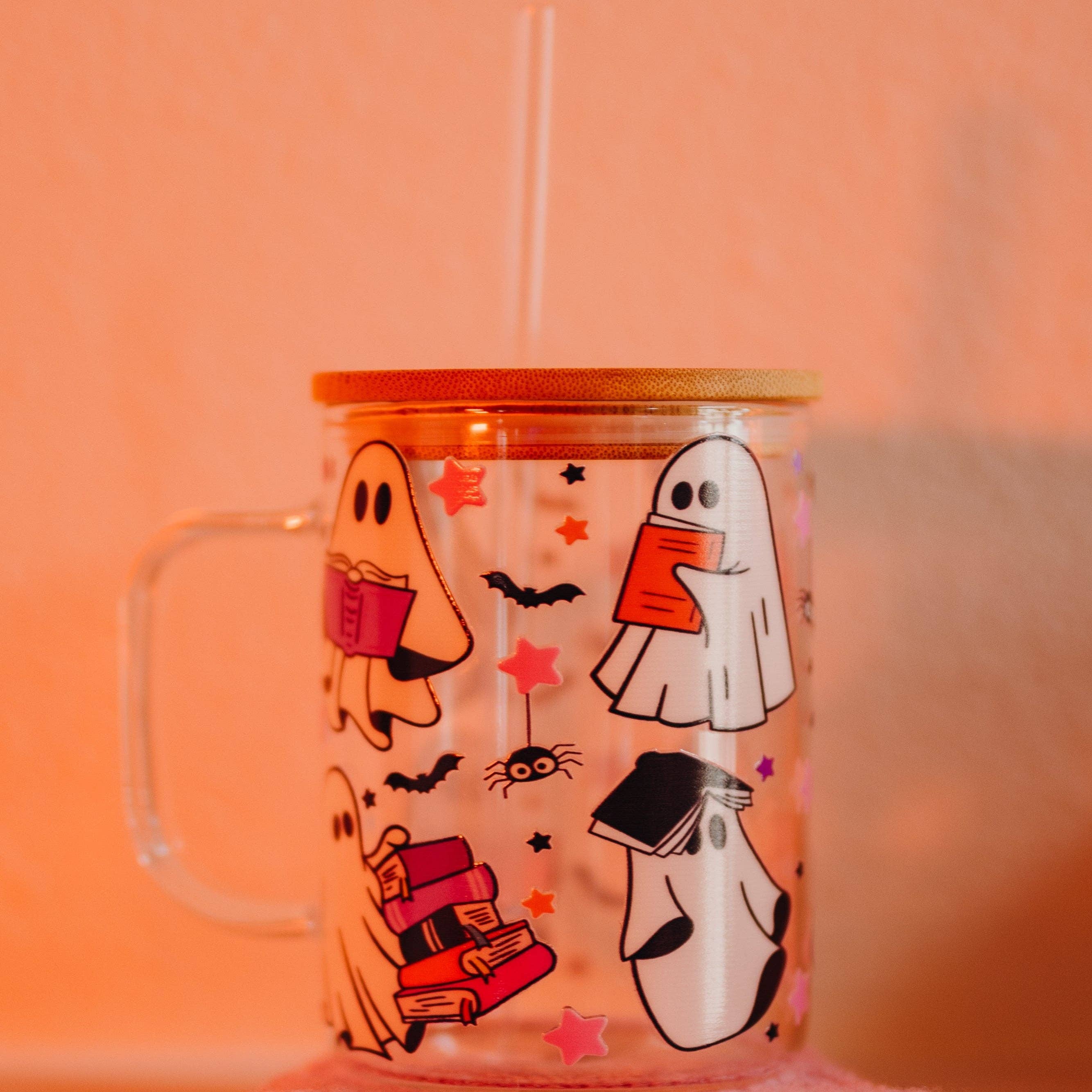 Sip-Sip Hooray! – wholesale Drinking glass/cup – Ghosts and Books 17oz Glass Mug With Lid and Straw1