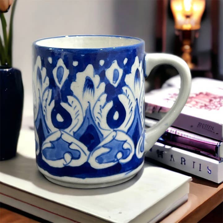 Blue Pottery Tea Coffee Mug - White Floral Design for wholesale by Heaven Spring Ltd