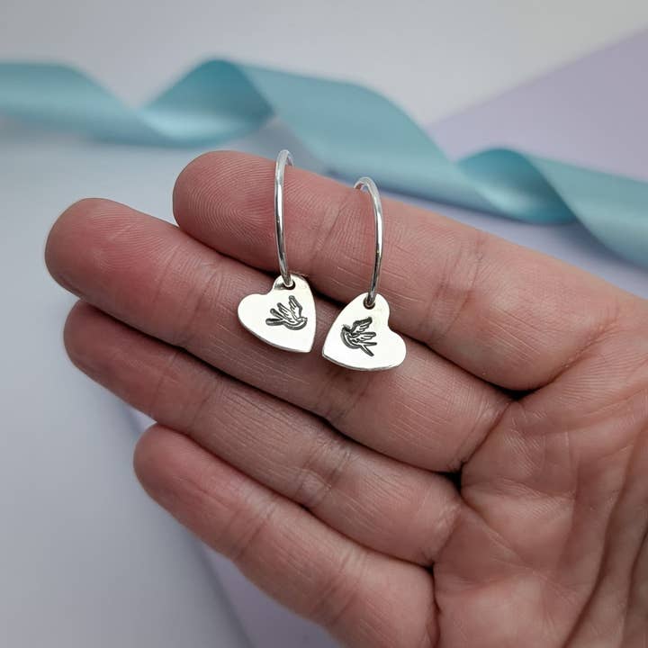 Swallow Heart Hoop Earrings. Recycled Sterling Silver for wholesale by Rebecca Davies Jewellery