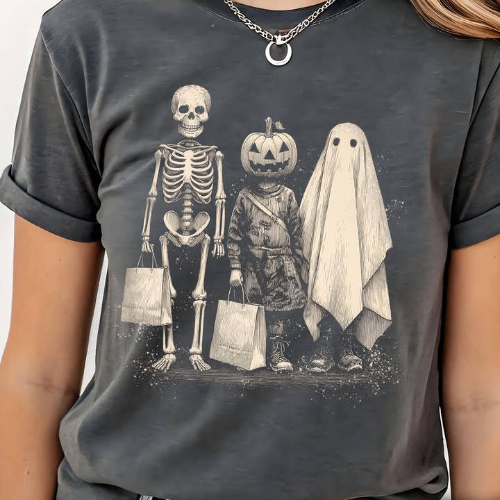 Spooky Squad Shirt, Funny Skeleton Ghost Pumpkin Sweatshirt for wholesale by NVC Ecommerce LLC