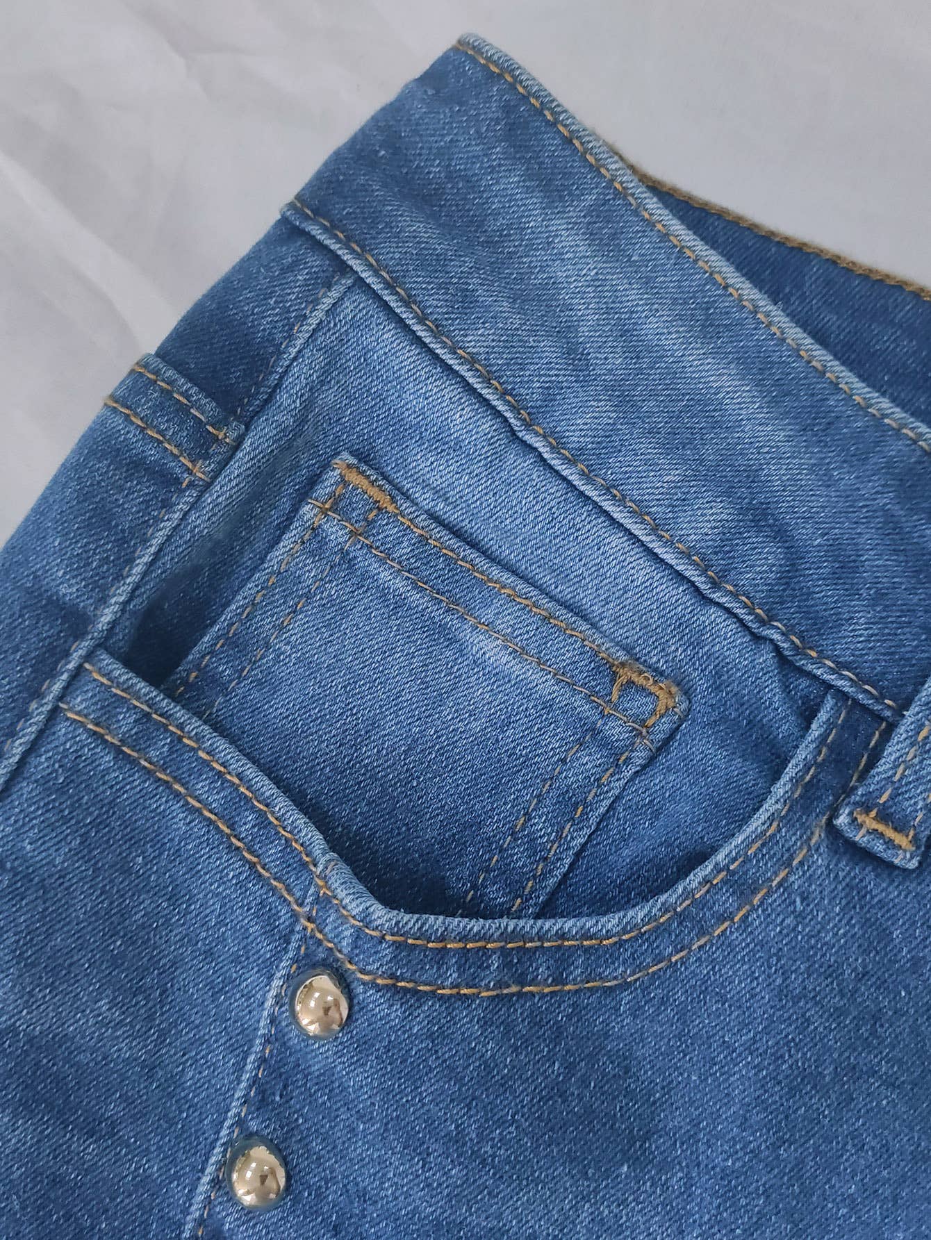 Blue High-waisted studded bootcut jeans for wholesale on Faire5