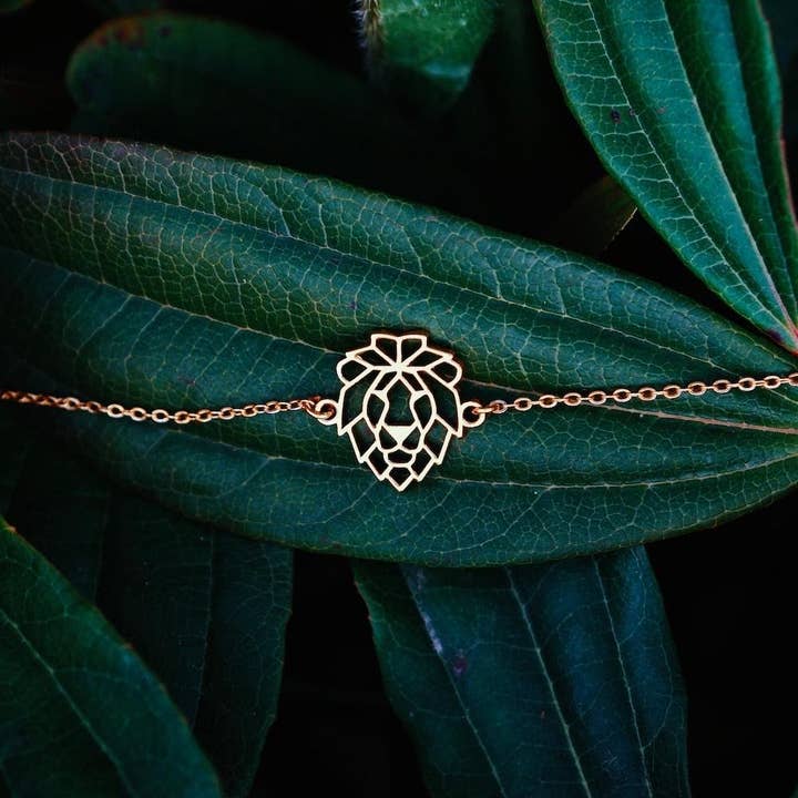 Bracelet lion or avec chaîne pour la vente par Mountplane