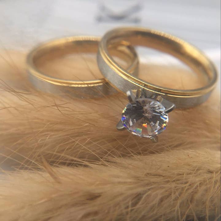 Pair of solitaire silver engagement rings-Size 10 for wholesale by HTB