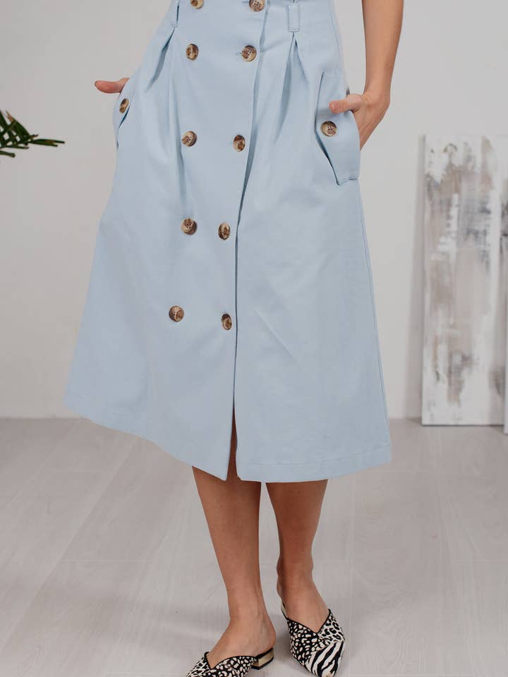 Blue denim buttoned skirt with side pockets for wholesale by Azuri Fashion Group