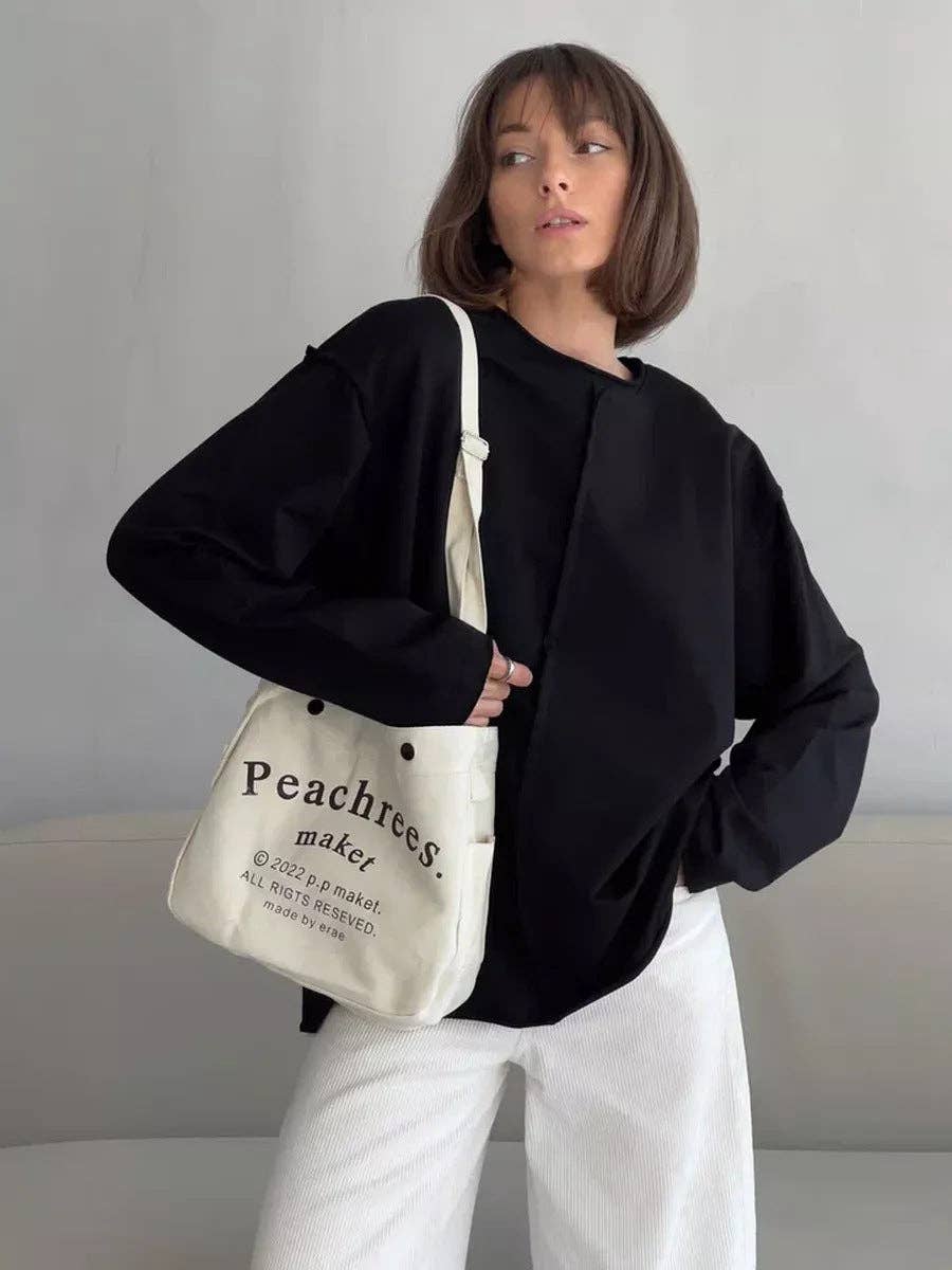 Suhkasana – wholesale T-shirt (utan tryck) – Dam – Avslappnad löst sittande bomullströja med långa ärmar och slitna detaljer.16