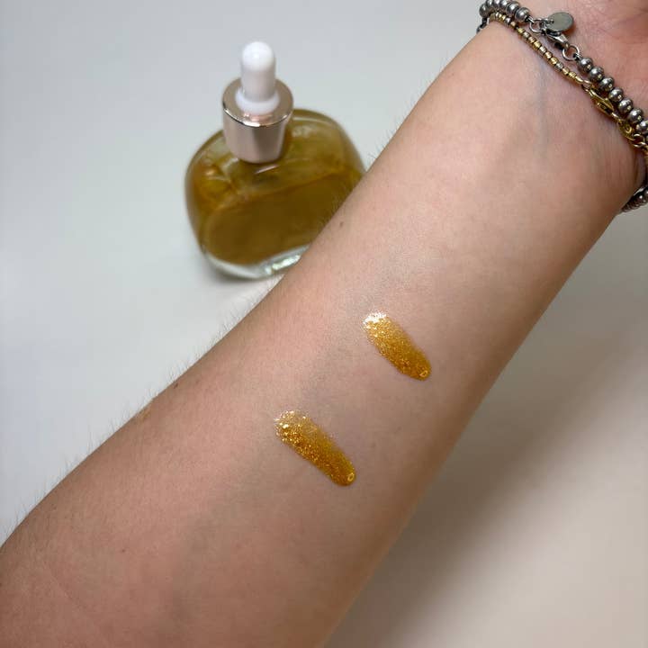 Vacay Shimmer Body Oil for wholesale by Shop Gia Taylor LLC.