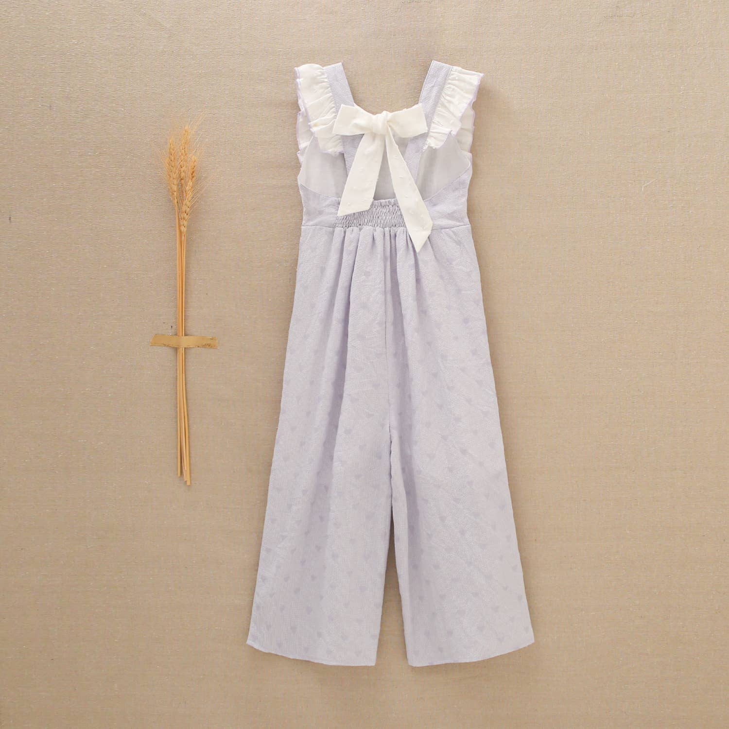 Lilac Girl's Jumpsuit With Hearts And Ruffles for wholesale on Faire6