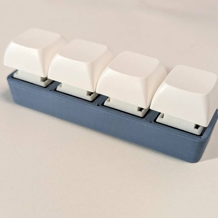 Strudel3D - Wholesale Fidget Toy - Kids - 4x1 Silent Stick Fidget Keychain