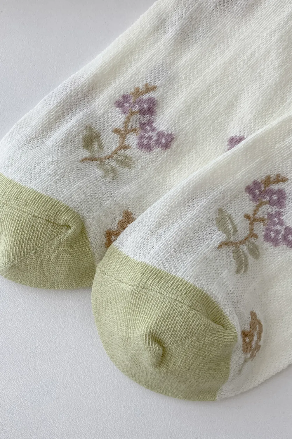 Lilac and green floral socks 🌿💜 for wholesale on Faire3