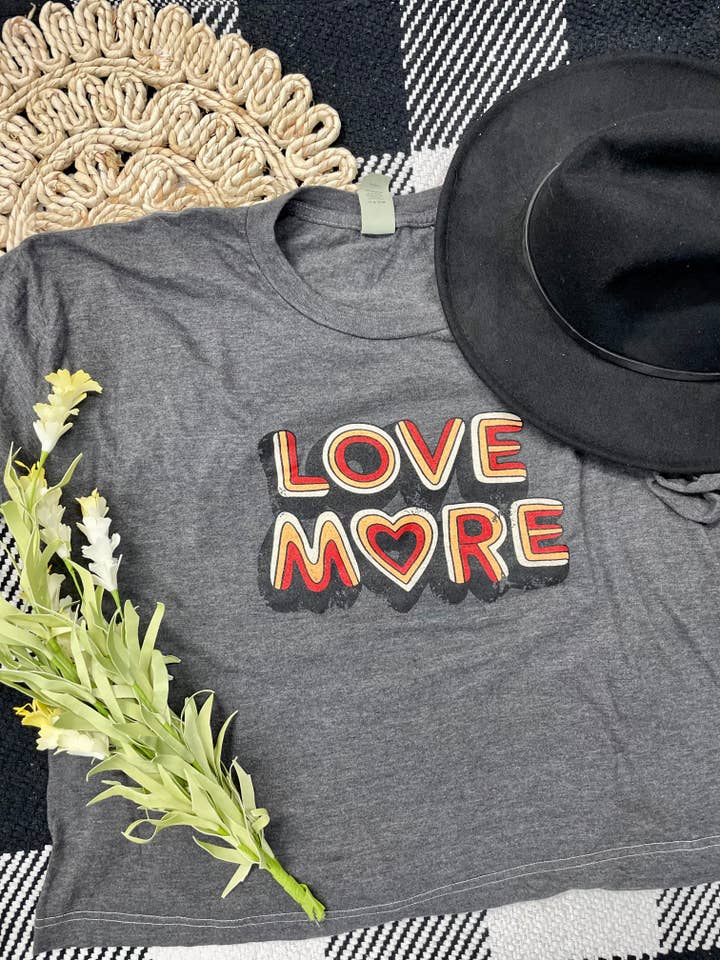 Love More Cropped Graphic Tee for wholesale by Shirts Plus, Inc.