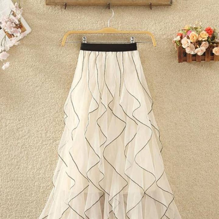 Mesh Midi Skirt with Wavy Patterns and other Purchase Wholesale polyester mesh fabric. Free Returns & Net 60 Terms on Faire trending on Faire.