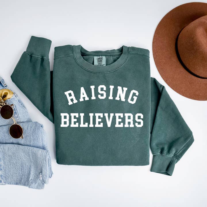 Raising Believers | Garment Dyed Sweatshirt for wholesale by Uplifting Threads Co Wholesale