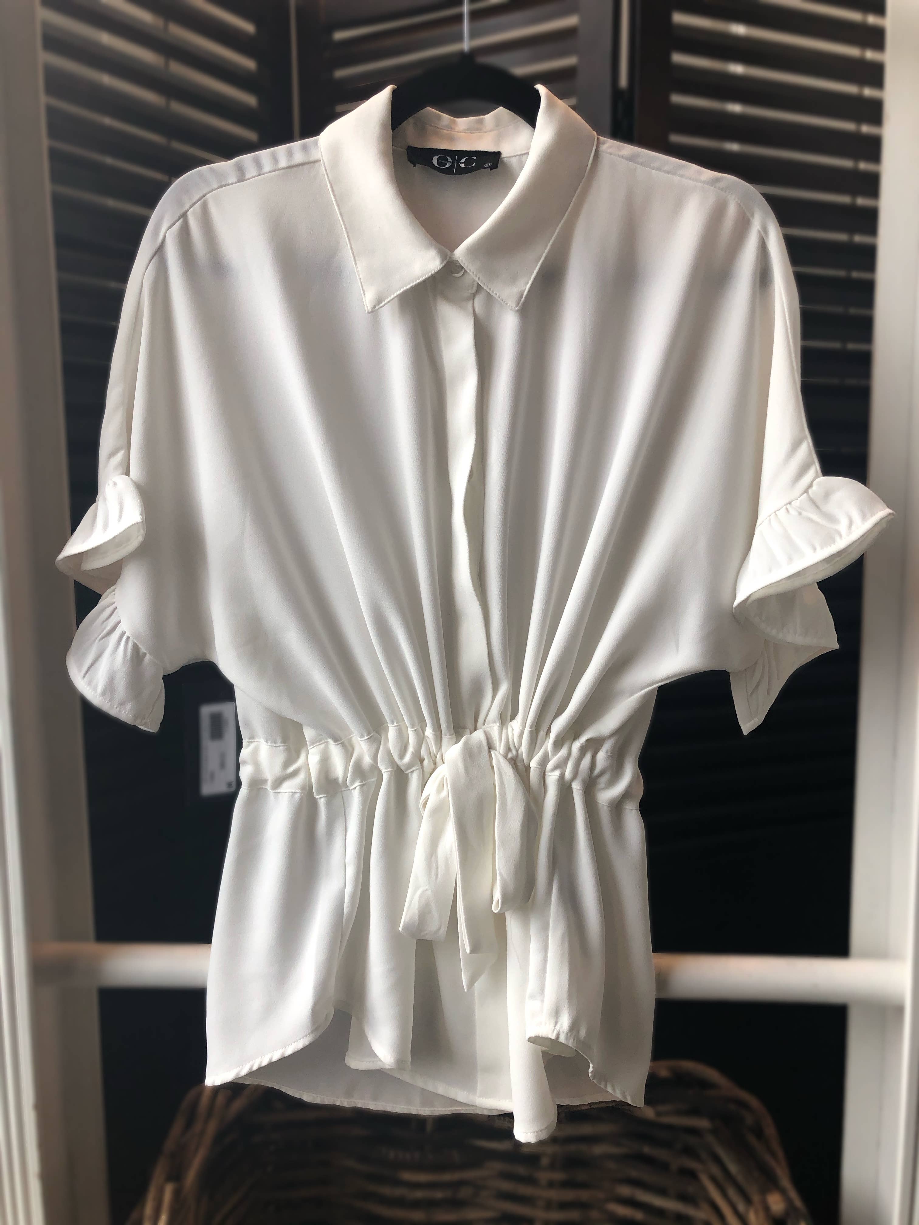 Osmond & Co. - Wholesale Blouse - Women's - Off White Ruffle Button Top0