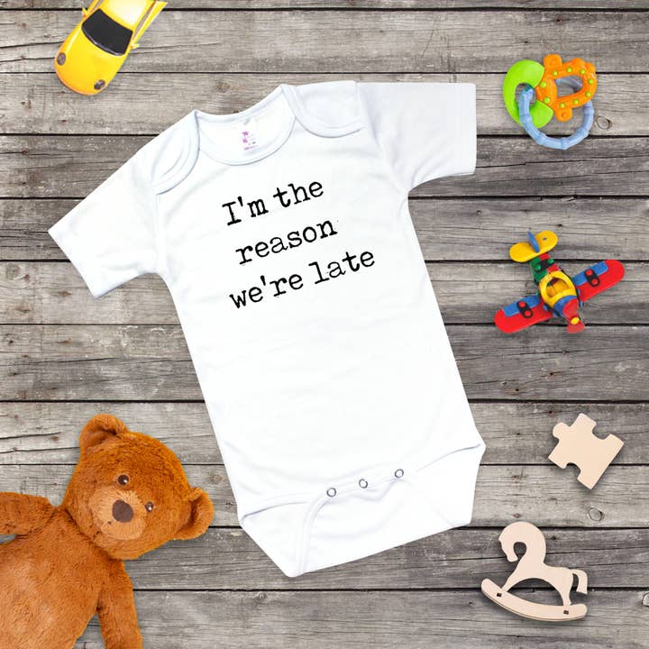 "I"m the Reason We're Late" - Funny Baby Onesie - for wholesale by ImprintKidsClothing