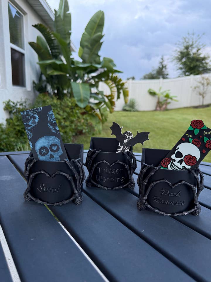 Skeleton Hands Bookmark Holder | Bookshelf Decor for wholesale by Create Fantasy Crafts