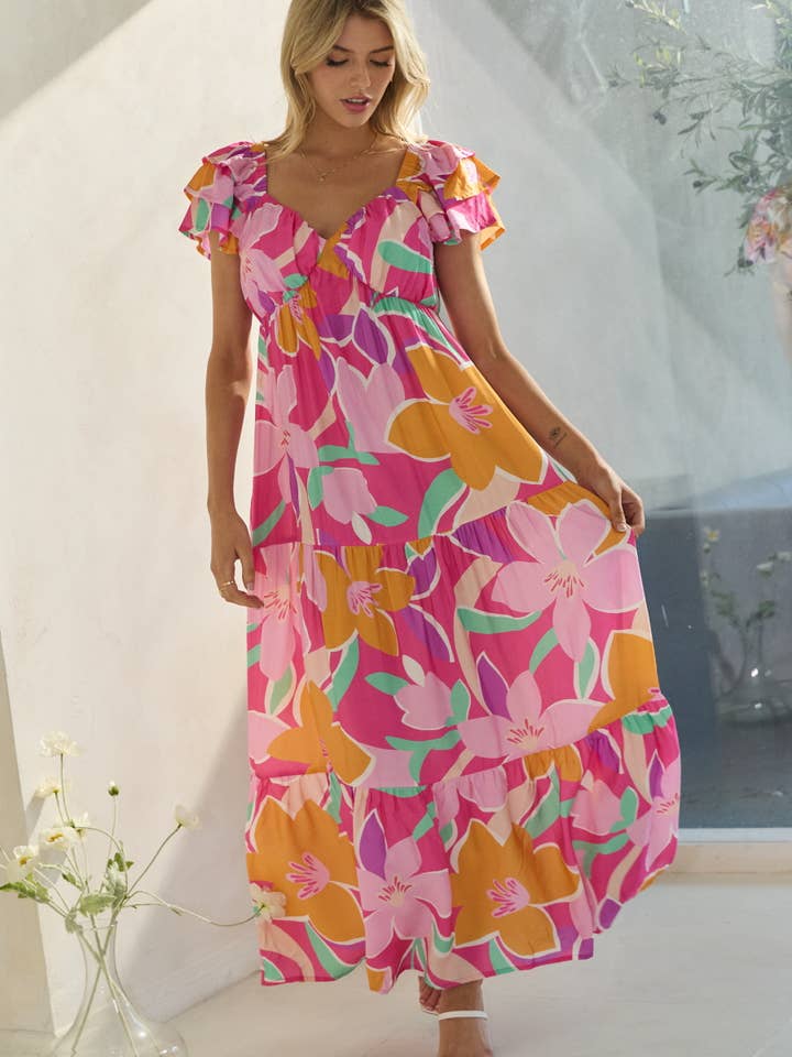 Abito lungo a balze con stampa floreale per la vendita all'ingrosso da parte di Oddi