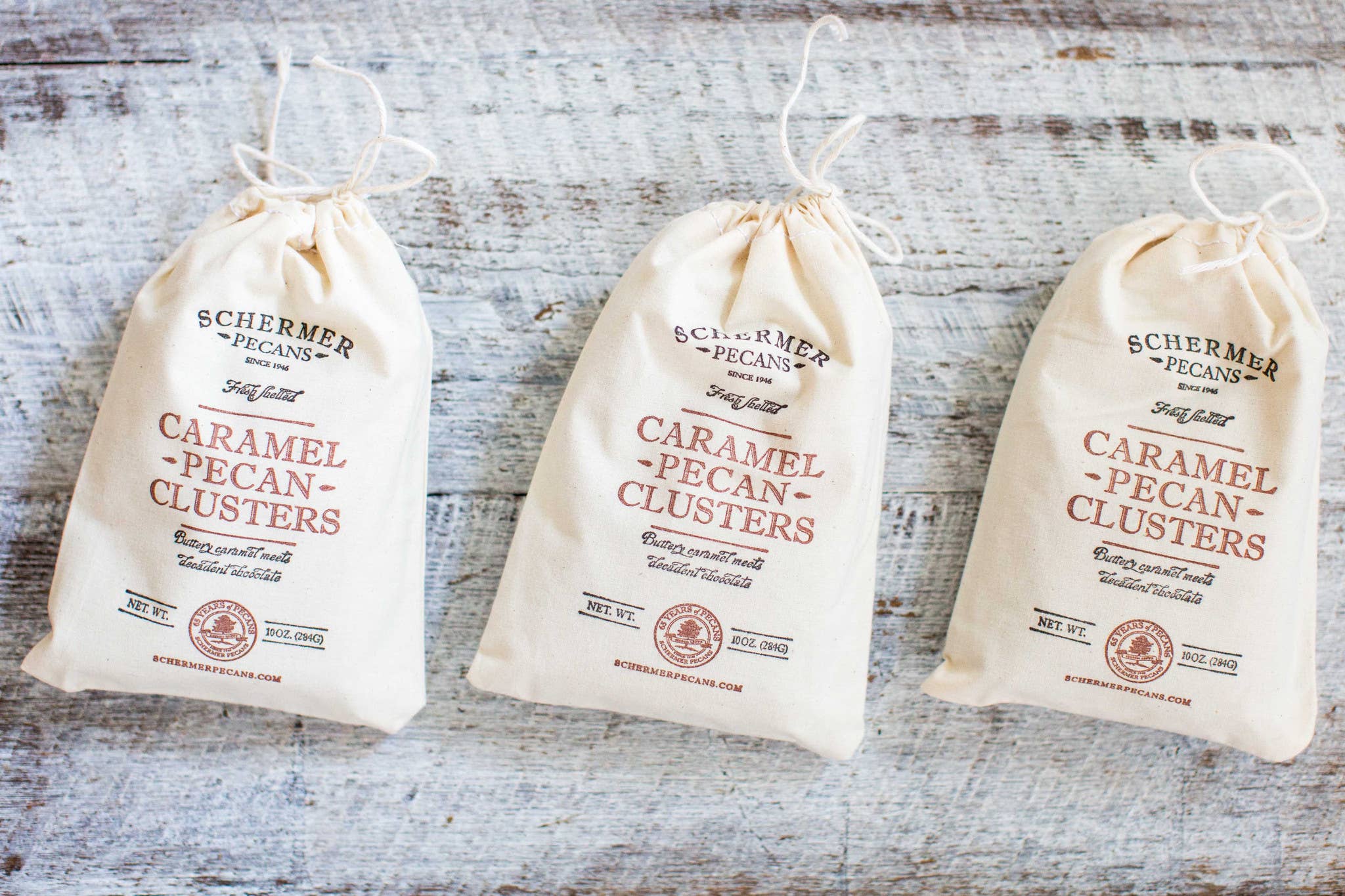 Schermer Pecans - Wholesale Nuts - PECAN CARAMEL CLUSTERS - GA Grown - 12 Cloth Bags/Case