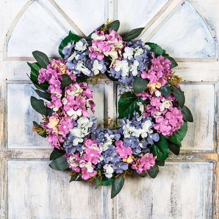 Hydrangea Wreath On A Twig Base, Slate Blue, Mauve, Mix for wholesale by KMI International Corp.