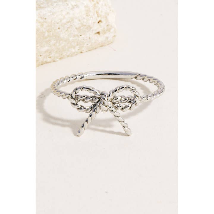 Twisted Metallic Ribbon Bow Band Ring and other Purchase Wholesale josselyn. Free Returns & Net 60 Terms on Faire trending on Faire.