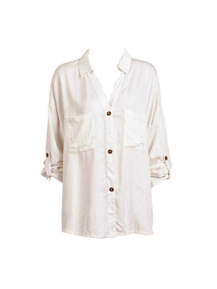 Blouse blanche Flas avec poches collier et fesses marron en vente