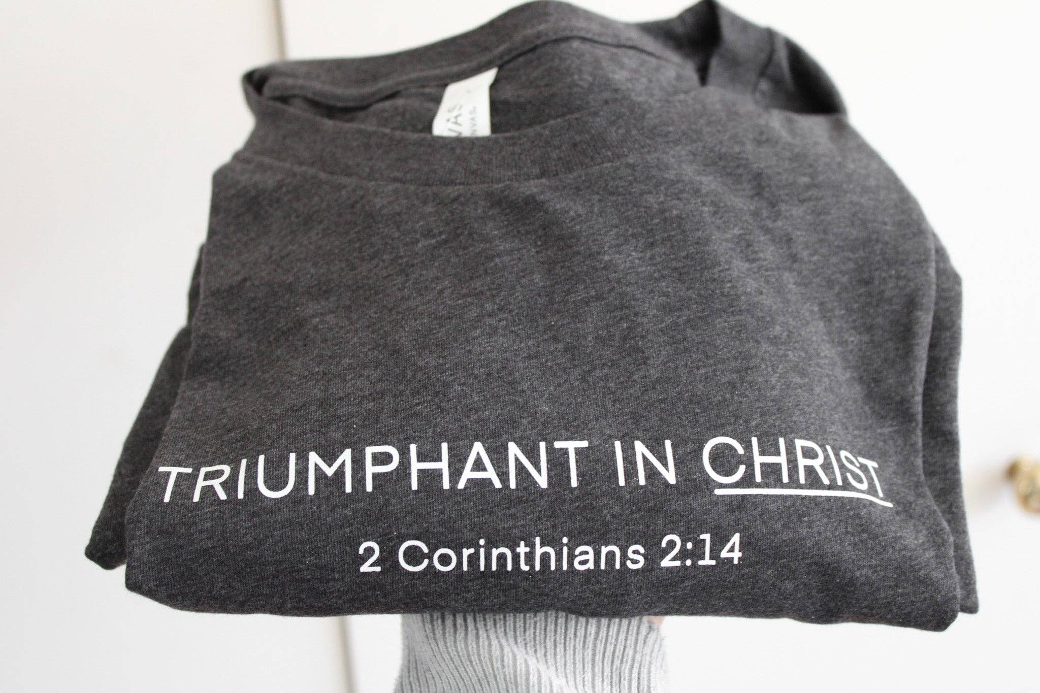Common Grace Print Shop - Wholesale Screen Printed T-Shirt - Women's - Triumphant in Christ UNISEX Short-Sleeve T-Shirt (Color: Heathered Charcoal)7
