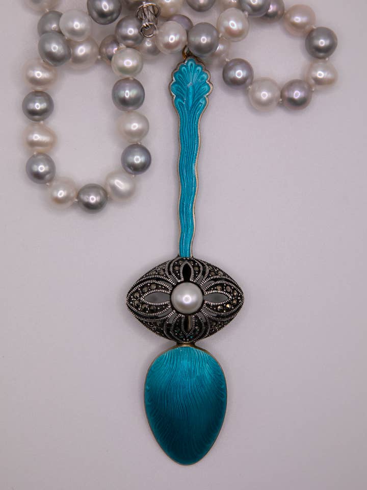 Turquoise spoon necklace with marcasite brooch and pearls. for wholesale by DecoFiniti LLC