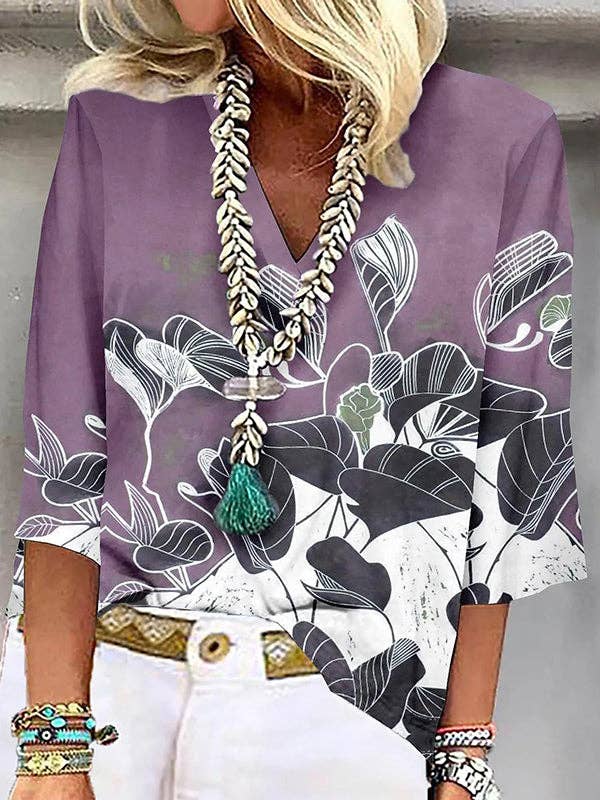 UZ Wholesale Store - Vendita all'ingrosso Camicetta - Donna - T-shirt larghe con scollo a V con stampa floreale e maniche a tre quarti2