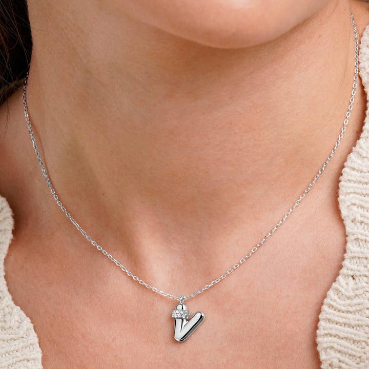 Itemporality - Wholesale Pendant/Charm Necklace - “V” initial necklace with volume, silver and zircon line1