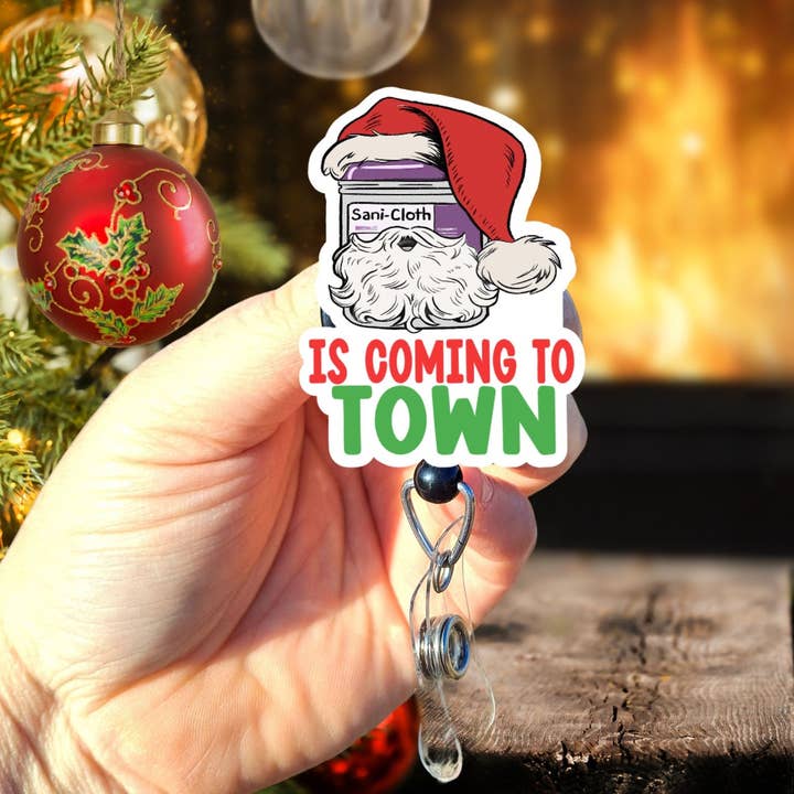Sani Clause is coming to town badge reel for wholesale by The Badge Boutique CO
