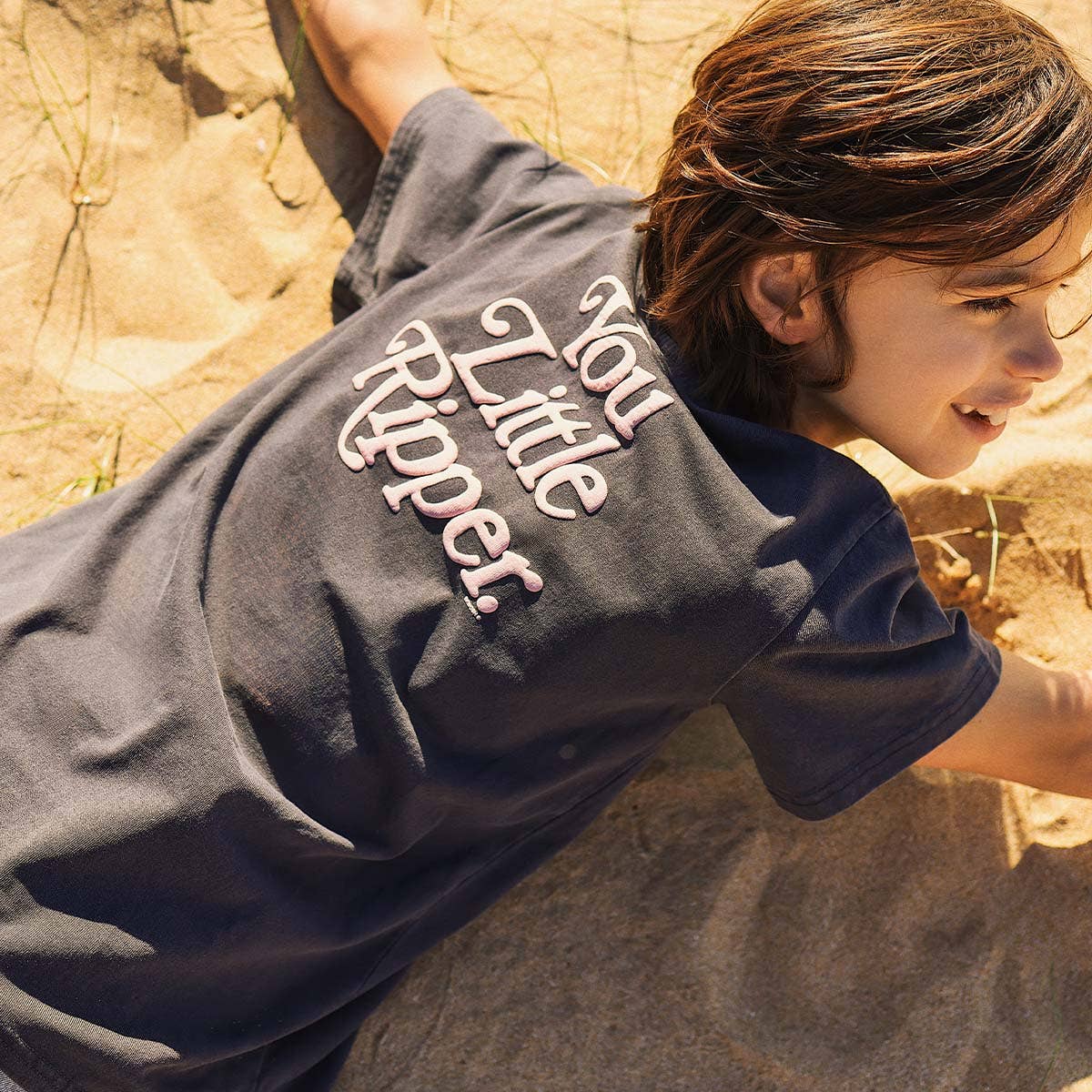 You Little Ripper Kids Slang Tee in Charcoal for wholesale on Faire6