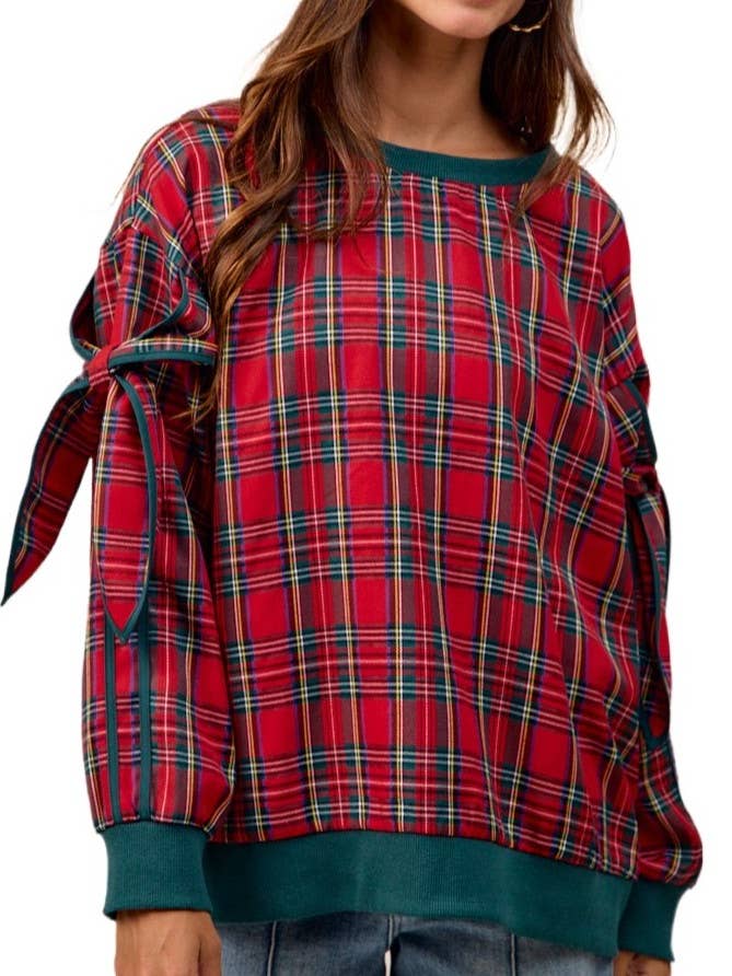 Topp med ärmar med rosettdetalj i julrutig. för wholesale av Vanilla Monkey