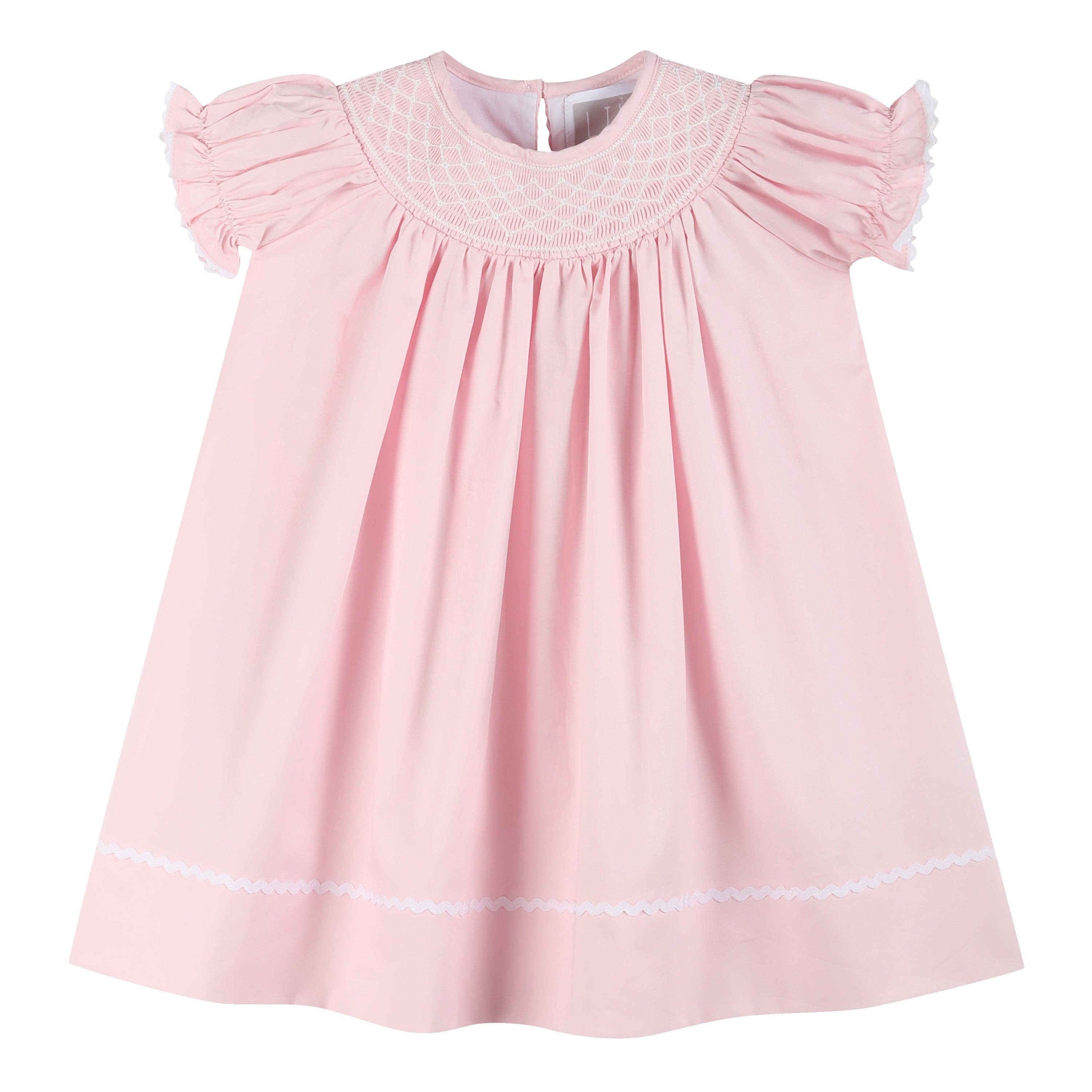 Lil Cactus - Wholesale Jurk - Kinderen - Roze en witte jurk met smockwerk en pofmouwen0