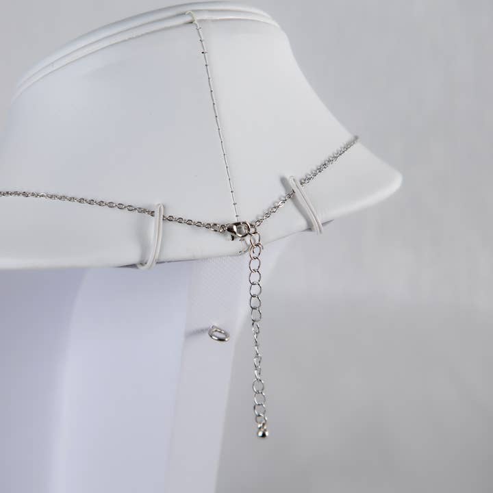 Silver Momma and Baby Elephant Necklace for wholesale on Faire3