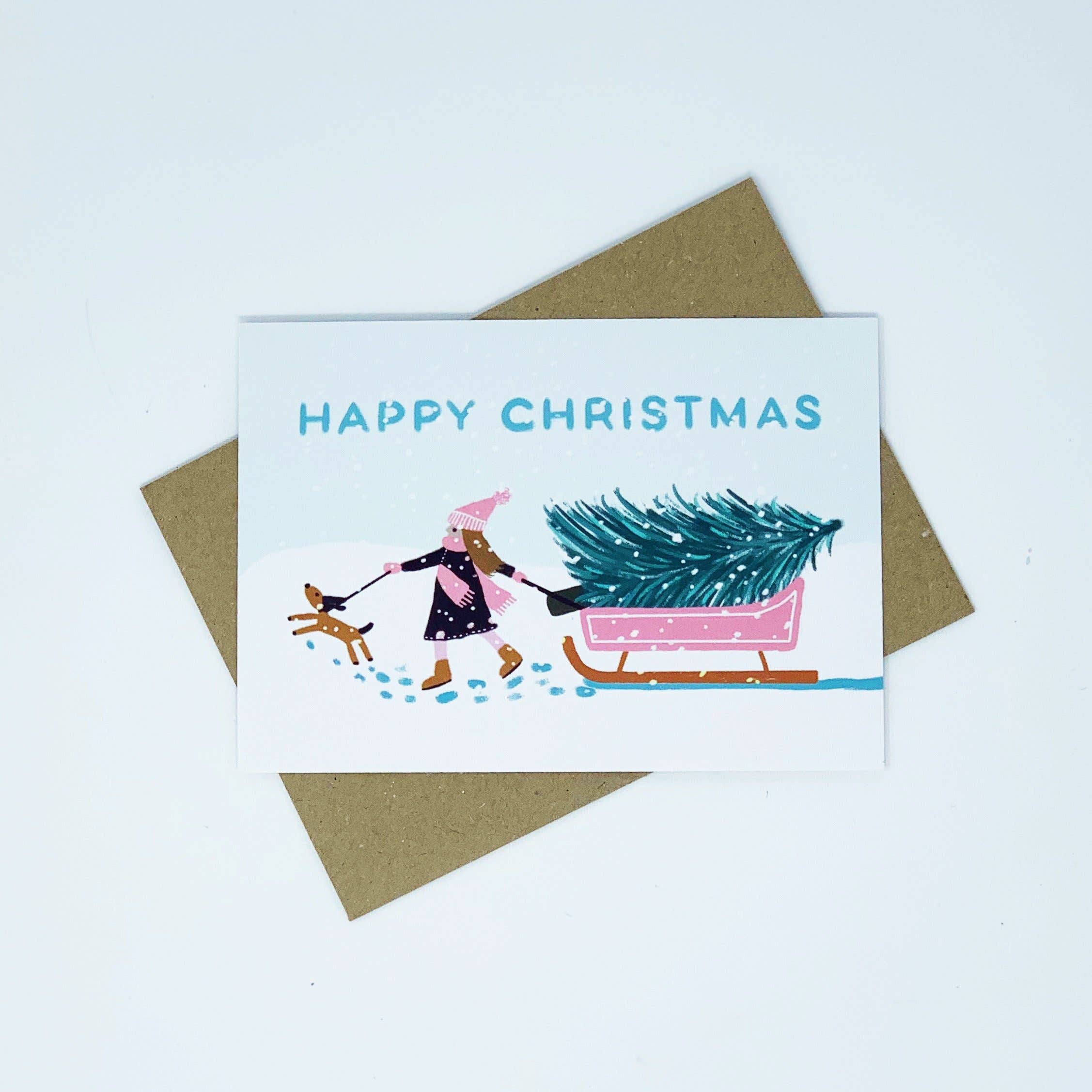 Lomond Paper Co – wholesale Christmas card – Girl with Pink Sledge - Happy Christmas3