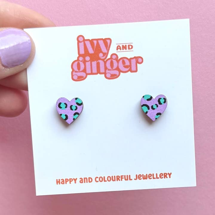 Mini leopard print heart studs in lilac and teal for wholesale by ivy and ginger