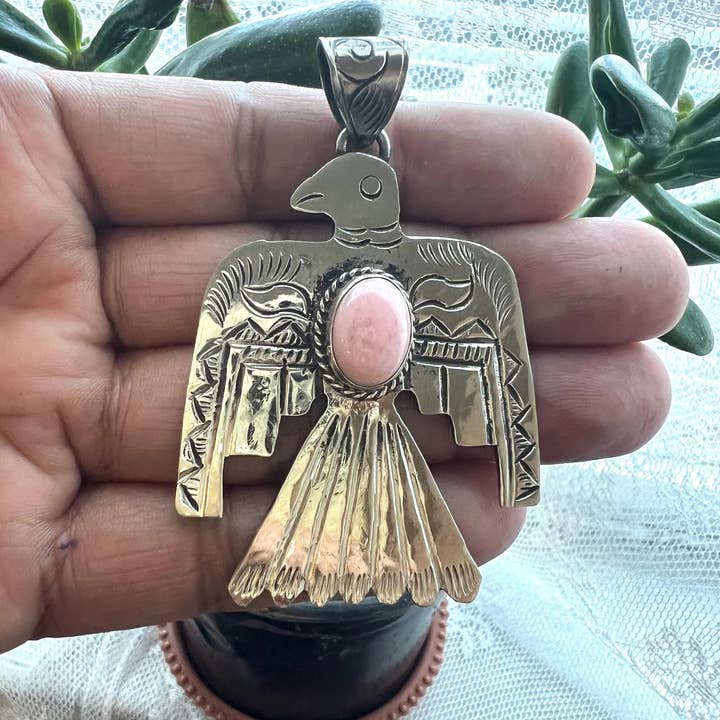 Handcrafted Thunderbird Pendant, Queen Conch Shell for wholesale by GTG Gems Corp