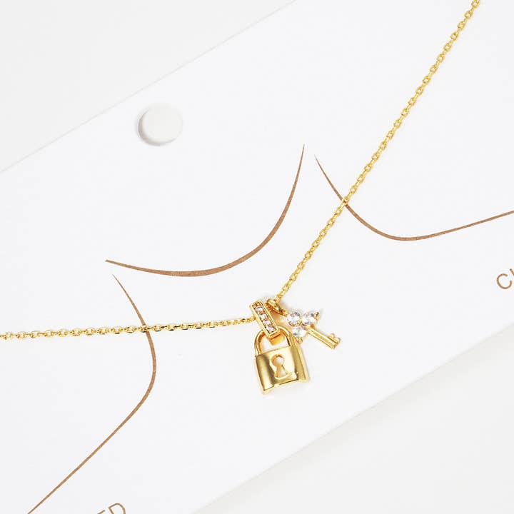 Sensibling Corp. - Wholesale Pendant/Charm Necklace - Gold Dipped CZ Stone Embellished Key Lock Pendant Necklace
3